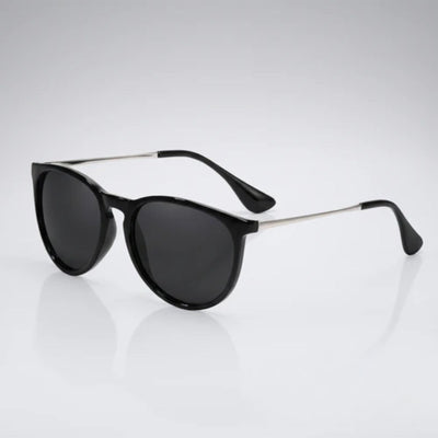 Stylish black round sunglasses with silver arms, perfect for everyday fashion wear