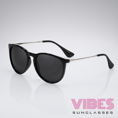 Stylish black sunglasses with silver arms, perfect for everyday fashion wear