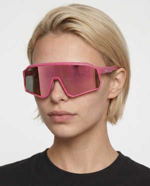Brooklyn sport shield sunglasses in Pink / Pink, pink lens on pink frame, worn by a woman, front view