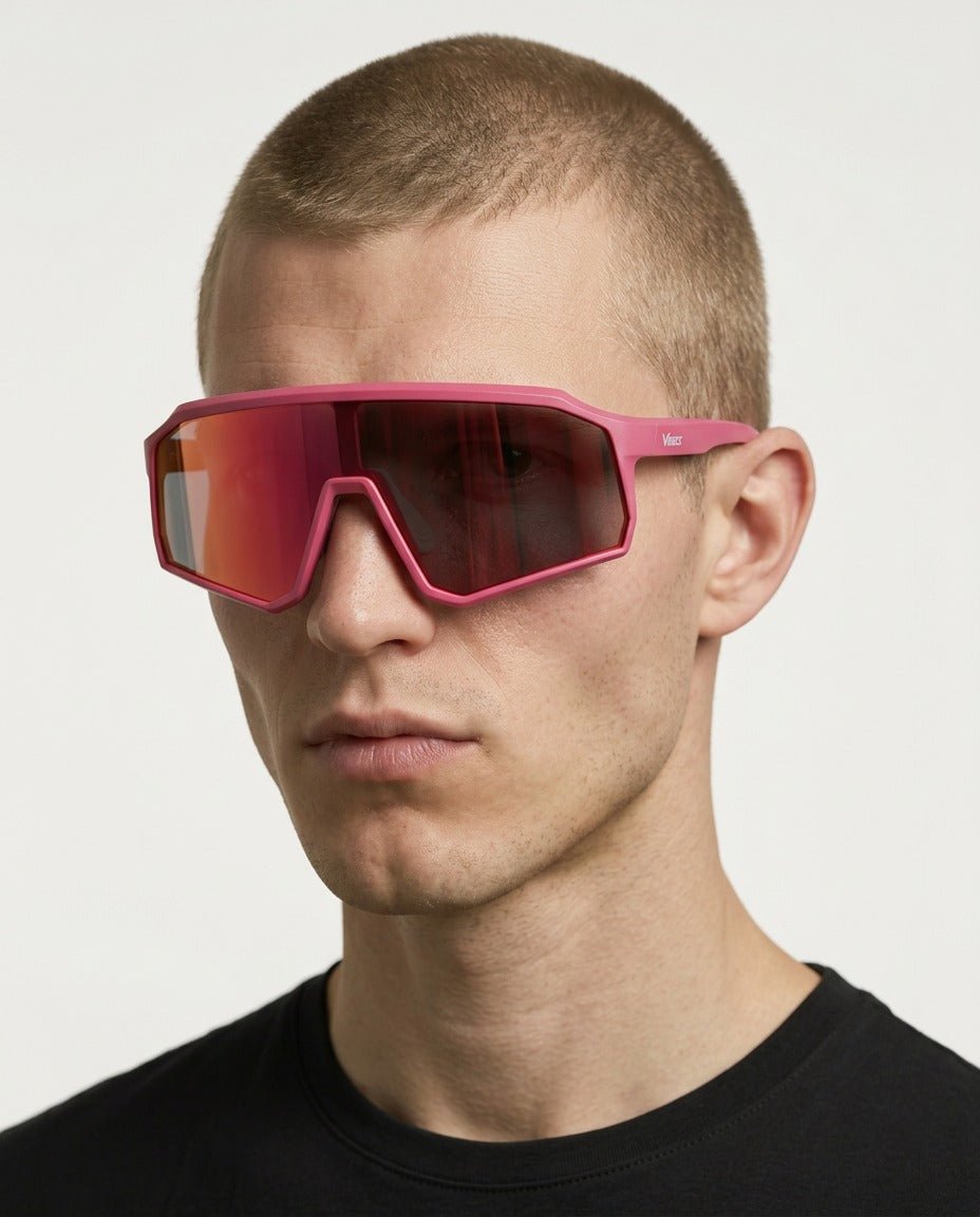 Brooklyn sport shield sunglasses in Pink / Pink, pink lens on pink frame, worn by a man, front view