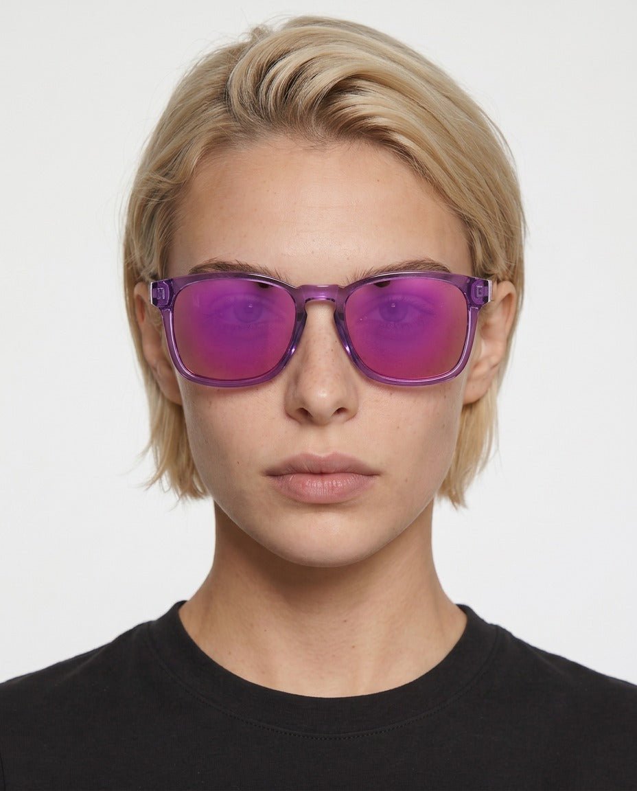 Loft square sunglasses in Pink / Clear Pink, pink lens on clear pink frame, worn by a woman, front view