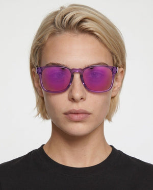 Loft square sunglasses in Pink / Clear Pink, pink lens on clear pink frame, worn by a woman, front view