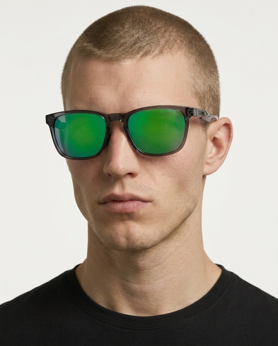 Marlow square sunglasses in Green / Smoke Grey, green lens on smoke grey frame, worn by a man, front view