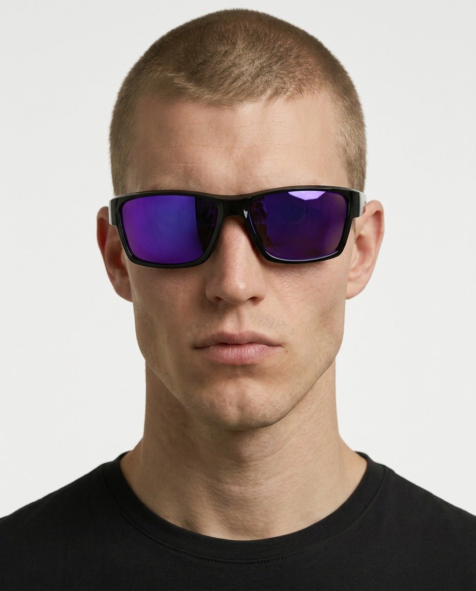 Specter slim wrap sunglasses in Purple / Black, purple lens on black frame, worn by a man, front view