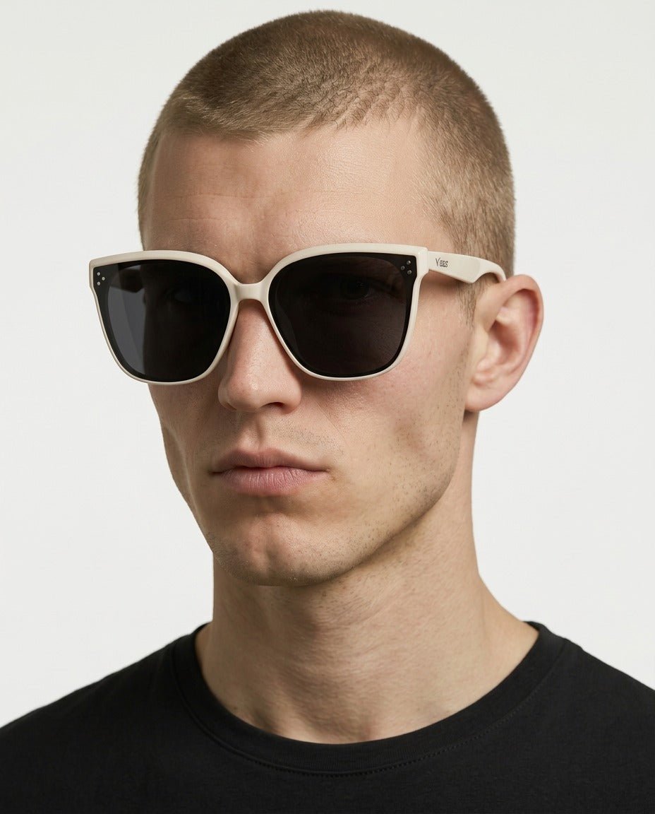 Vesper oversized square sunglasses in Black / Cream, black lens on cream frame, worn by a man, front view