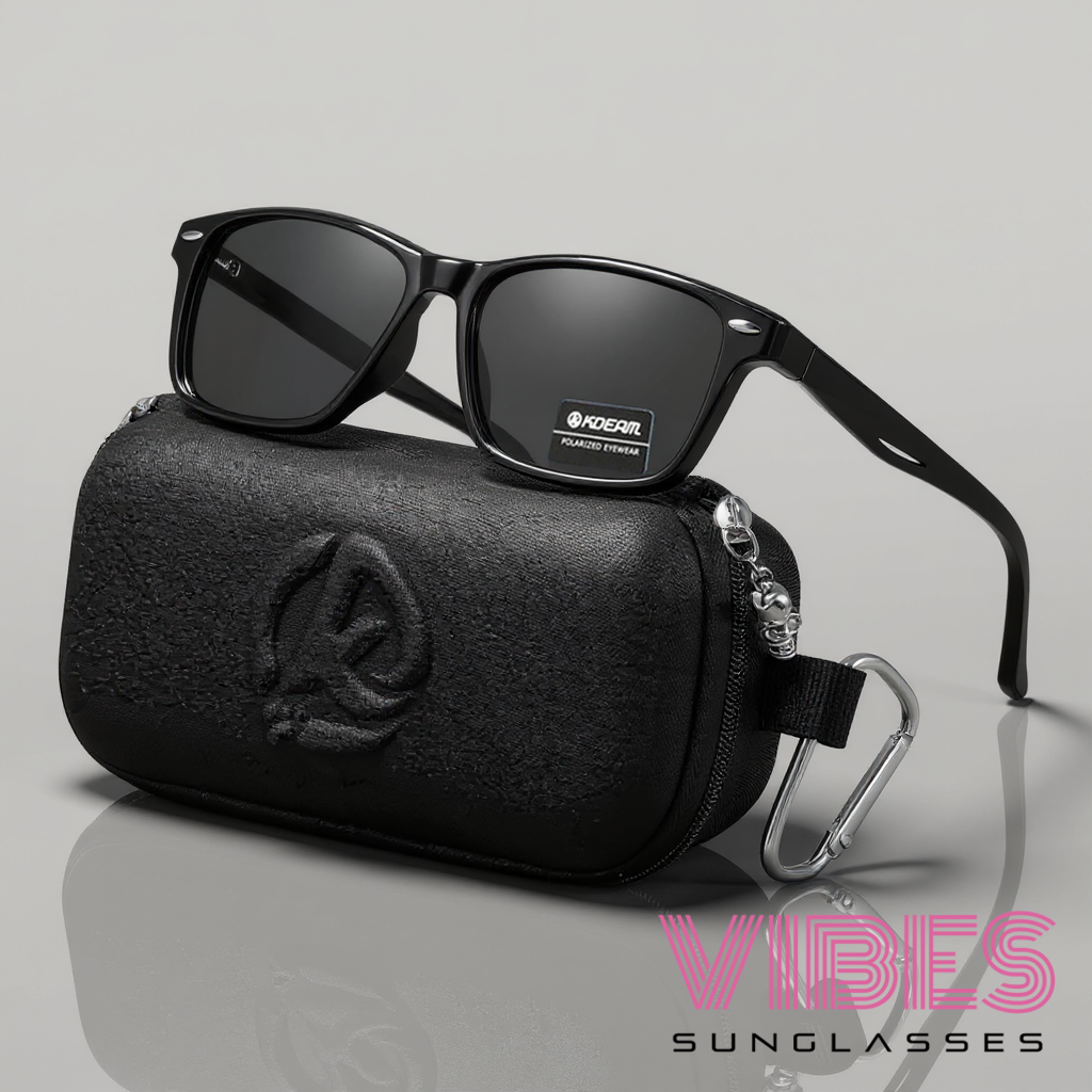 Stylish black polarized sunglasses with sleek case and skull charm, perfect for trendy everyday wear.