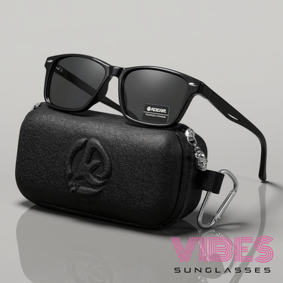 Stylish black polarized sunglasses with sleek case and skull charm, perfect for trendy everyday wear.