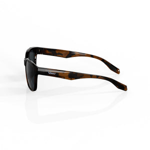 Delta 9 oversized round sunglasses in Black / Tortoise, black lens on tortoise frame, side view