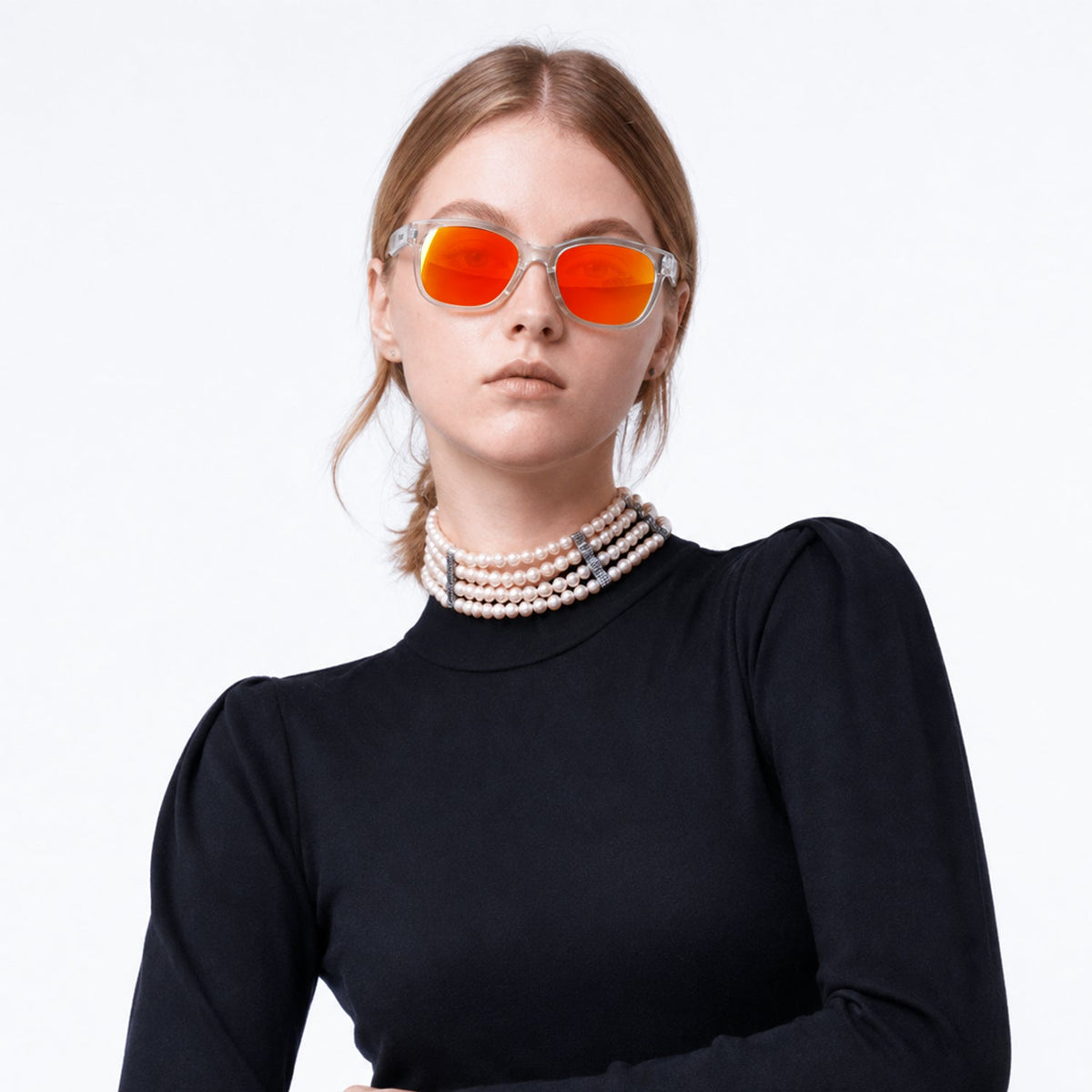 Delta 9 oversized round sunglasses in Orange / Clear, orange lens on clear frame, worn, front view