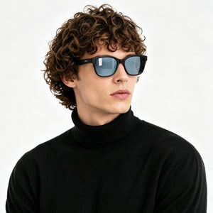 Delta 9 oversized round sunglasses in Grey / Black, grey lens on black frame, worn, side view