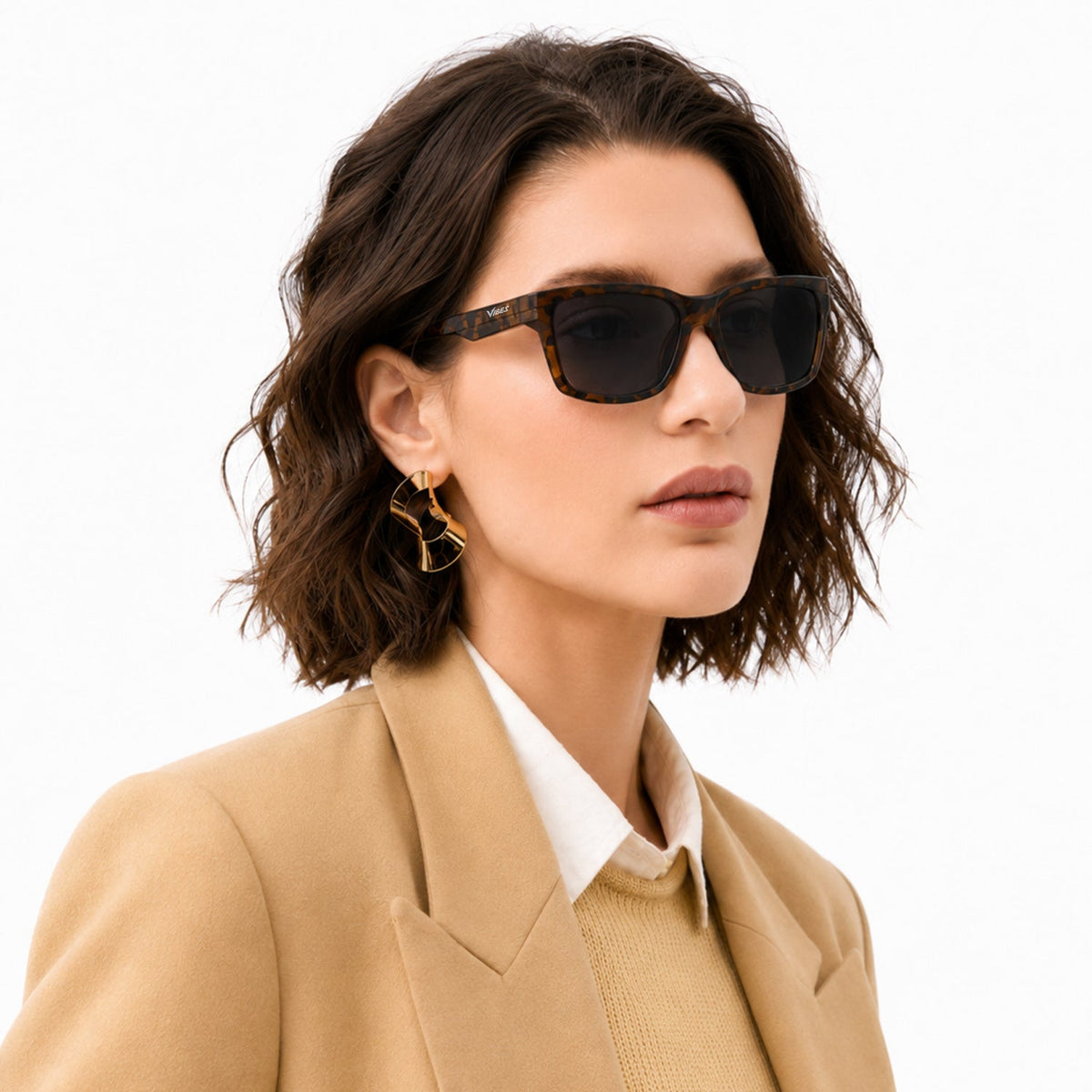 Flux sport wrap sunglasses in Black / Tortoise, black lens on tortoise frame, worn, side view