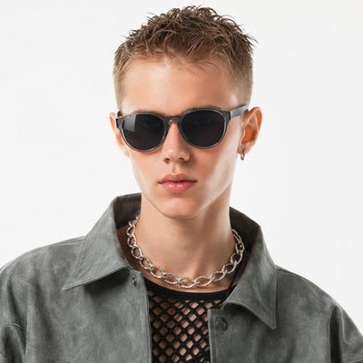 Hollis retro round sunglasses in Grey / Clear Grey, grey lens on clear grey frame, worn, front view