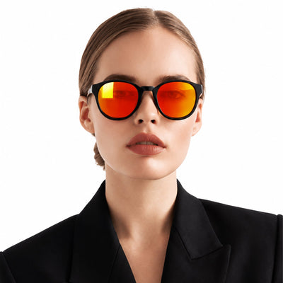 Hollis retro round sunglasses in Orange / Black, orange lens on black frame, worn, front view