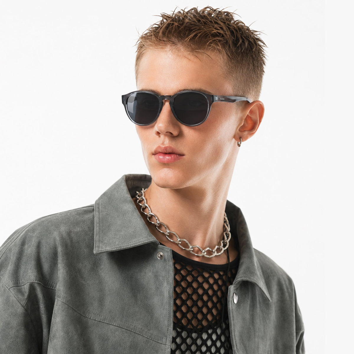 Hollis retro round sunglasses in Grey / Clear Grey, grey lens on clear grey frame, worn, side view