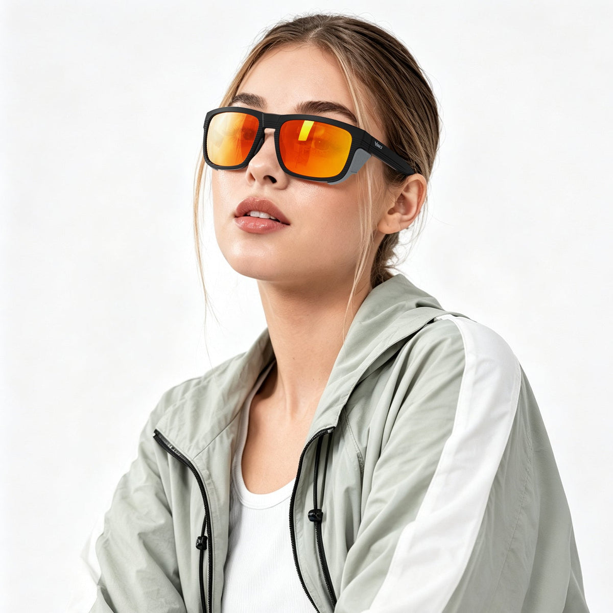 Juno side-shield wrap sunglasses in Orange / Black, orange lens on black frame, worn, side view