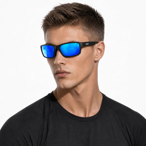 Nova sport wrap sunglasses in Blue / Black, blue lens on black frame, worn by a man, side view