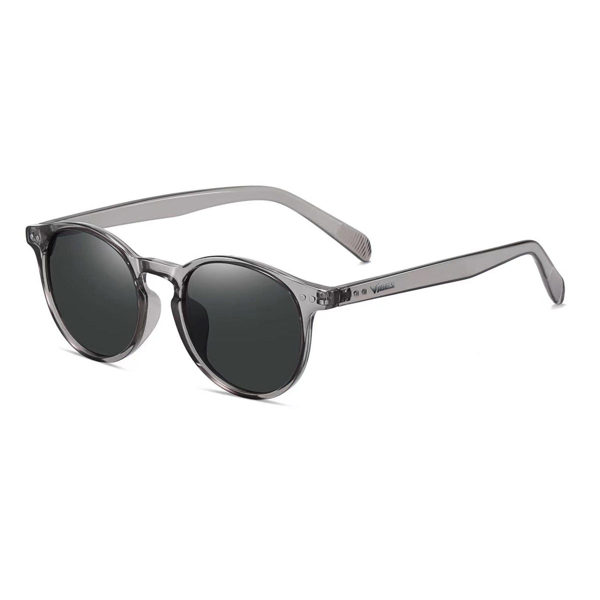 Onyx round retro sunglasses in Black / Clear Grey, black lens on clear grey frame, three-quarter view
