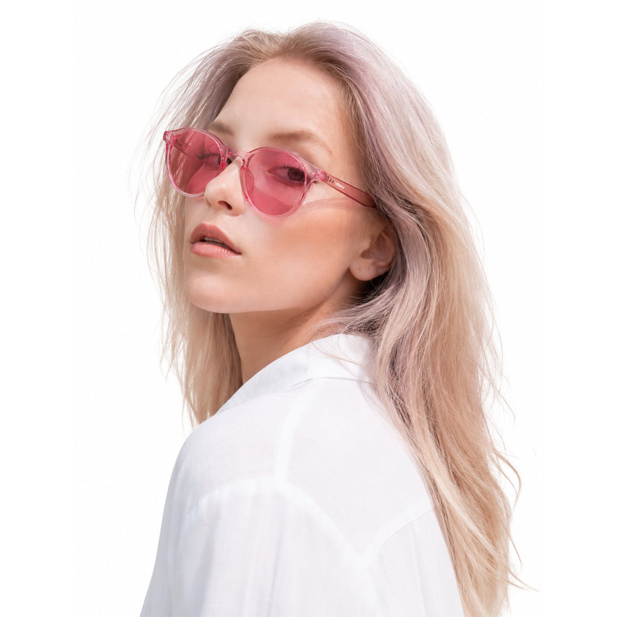 Onyx round retro sunglasses in Pink / Clear Pink, pink lens on clear pink frame, side view