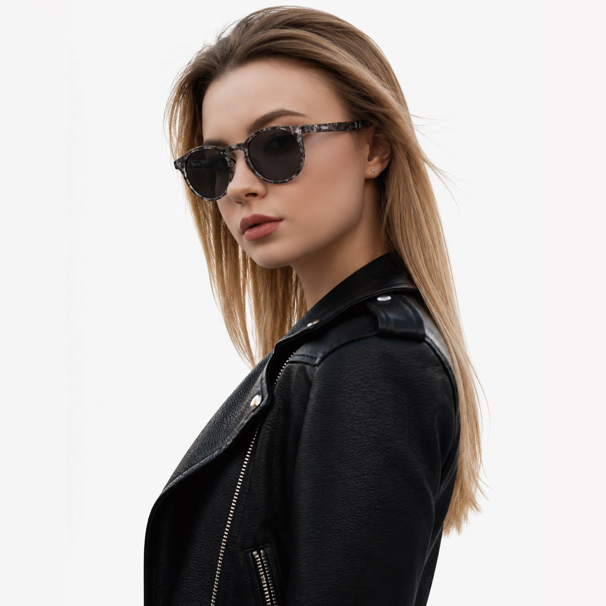 Onyx round retro sunglasses in Black / White Tortoise, black lens on white tortoise frame, side view