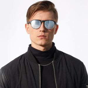 Orbit rounded aviator sunglasses in Silver / Black, silver lens on black frame, worn, front view