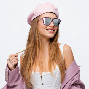 Radar performance wrap sunglasses in Silver / Purple, silver lens on purple frame, worn, side view