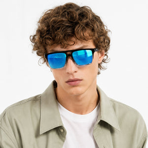 Sasha flat-top square sunglasses in Blue / Black/Clear, blue lens on black/clear frame, worn, front view