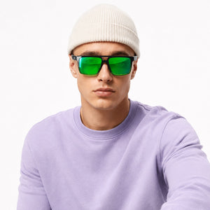 Sasha flat-top square sunglasses in Green / Black, green lens on black frame, worn, front view