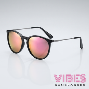 Stylish black sunglasses with pink mirrored lenses, perfect for trendy everyday wear.