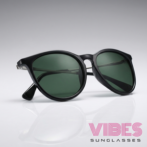 Stylish black-framed sunglasses with green lenses, perfect for trendy everyday wear.