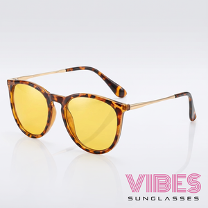 Tortoiseshell sunglasses with yellow lenses and gold accents for trendy everyday wear