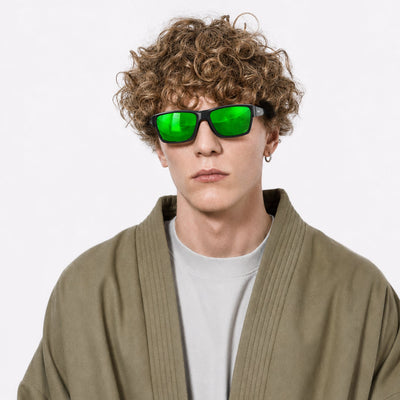 Specter slim wrap sunglasses in Green / Black, green lens on black frame, worn, front view