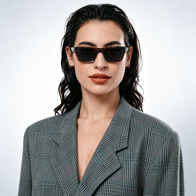 Specter slim wrap sunglasses in Black / Tortoise, black lens on tortoise frame, worn, front view