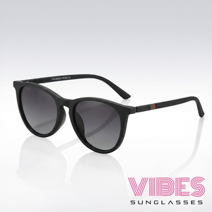 Stylish black polarized sunglasses with gradient lenses and green-red temple accents