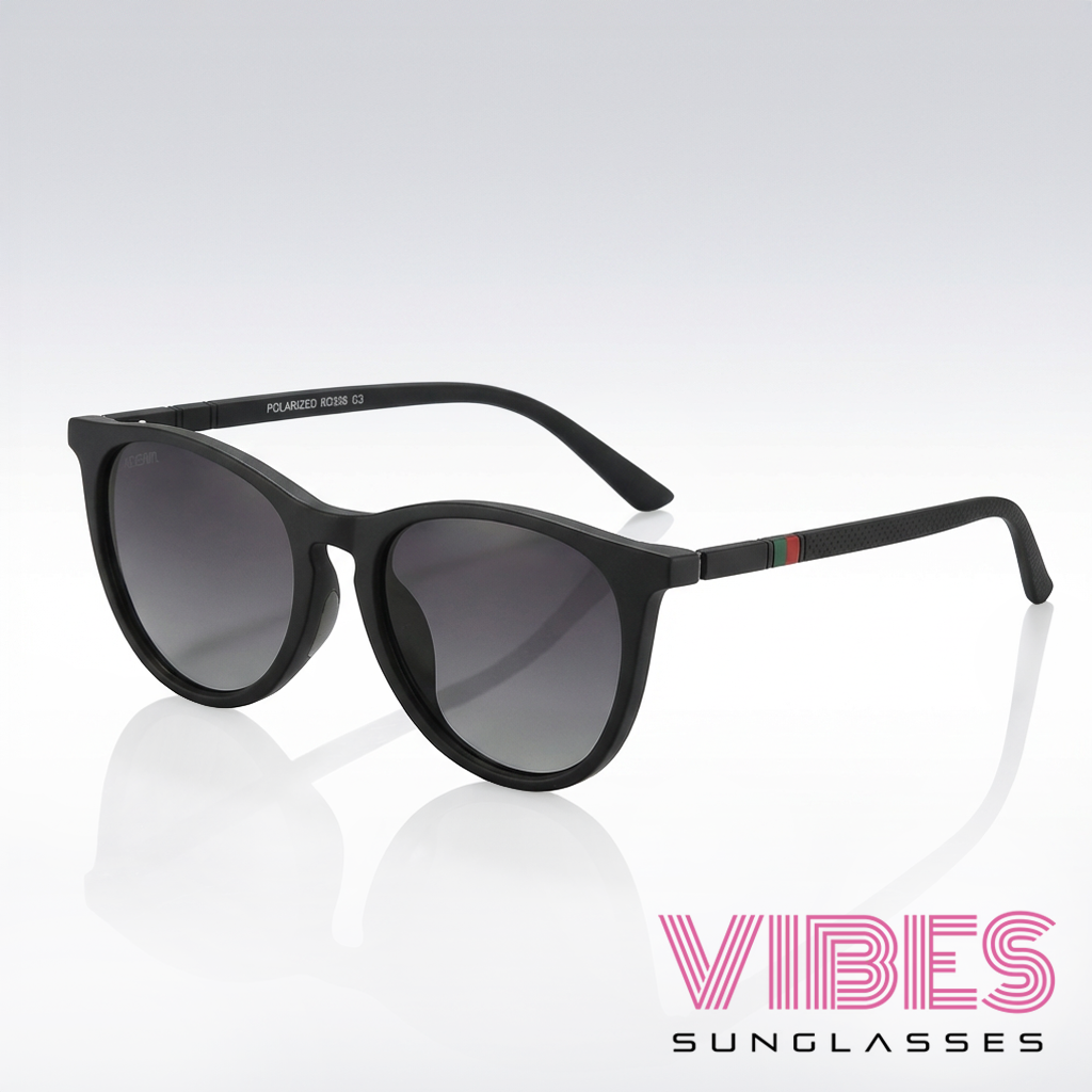 Stylish black polarized sunglasses with gradient lenses and green-red temple accents